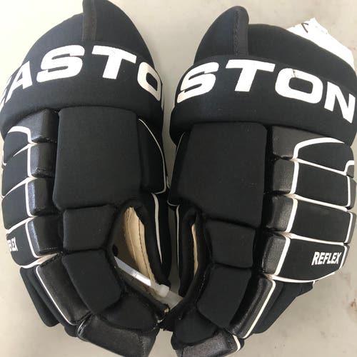 Nearly new Easton 14” black hockey gloves