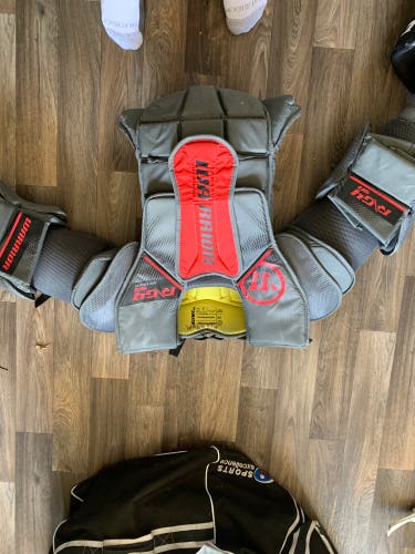 Used Medium Warrior  Ritual G4 Goalie Chest Protector