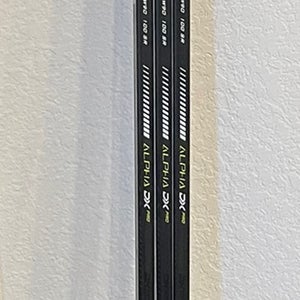 Used Warrior 3 Pack Left Hand Mid Pattern Pro Stock Alpha DX Hockey Stick
