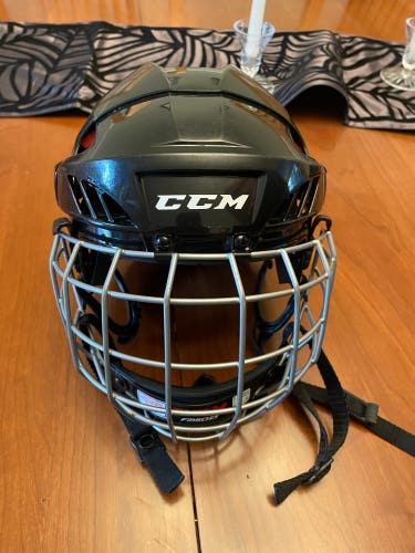 Used Small CCM 50 combo Helmet