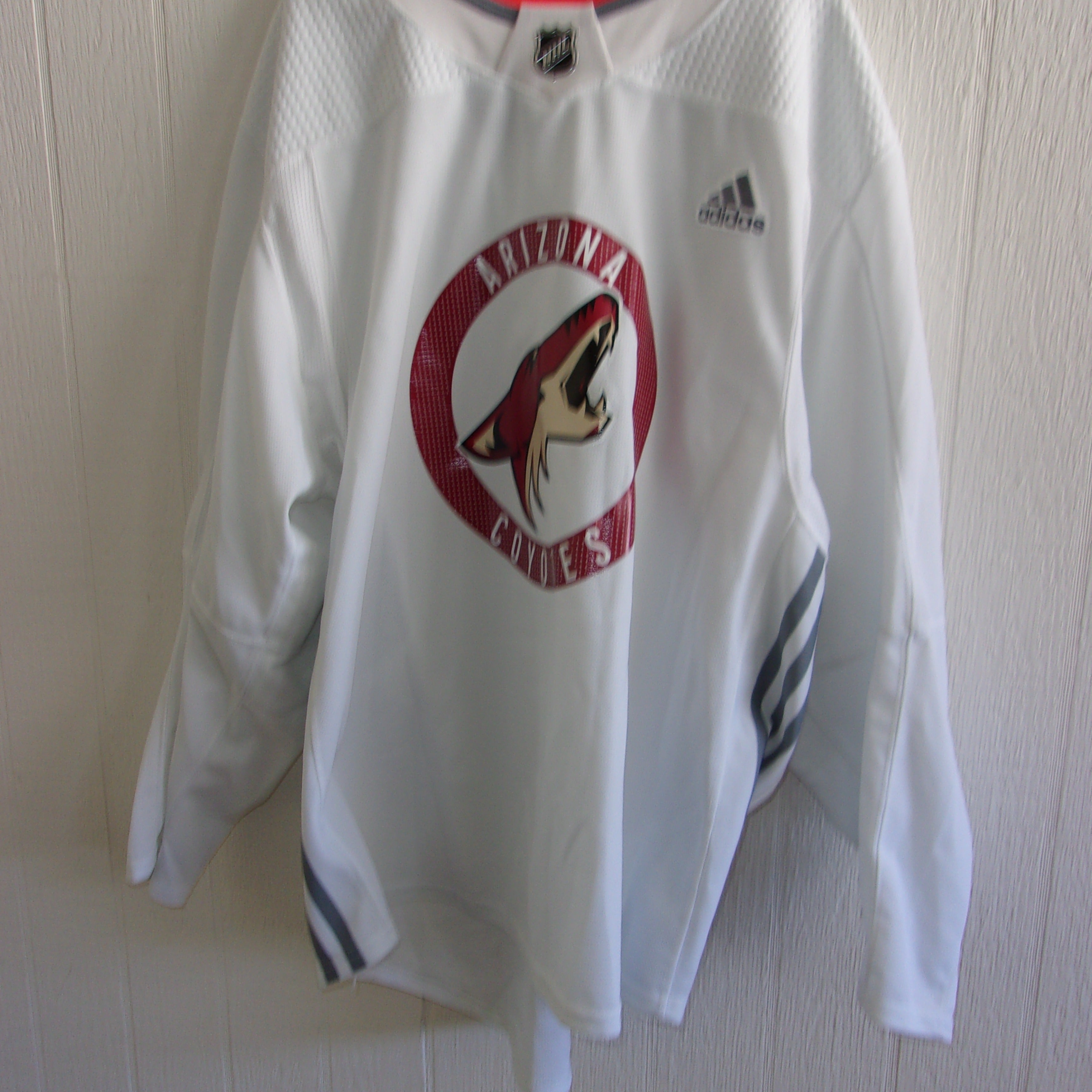 Phoenix Coyotes unused gray old-logo Reebok practice jersey w white gussets  (size 56 sewn on tail)