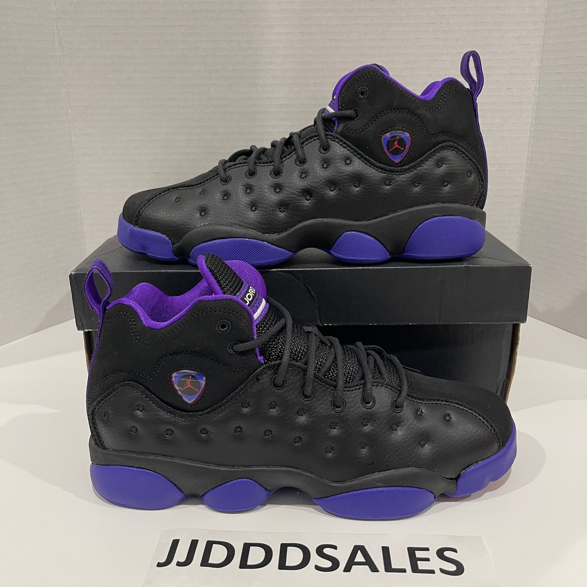 black and purple team jordans