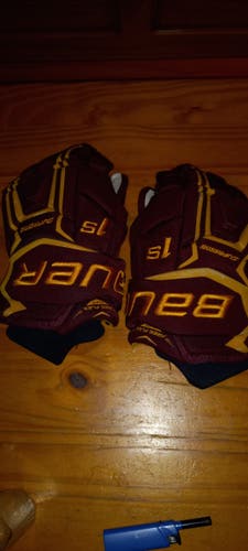 U of M maroon & gold Bauer Supreme 1S Gloves 13"