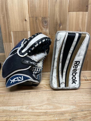 Used Regular Reebok 6K Goalie Catcher and 18K Blocker.