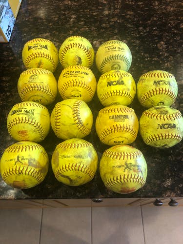 Used 14 pack 12 inch Yellow softballs