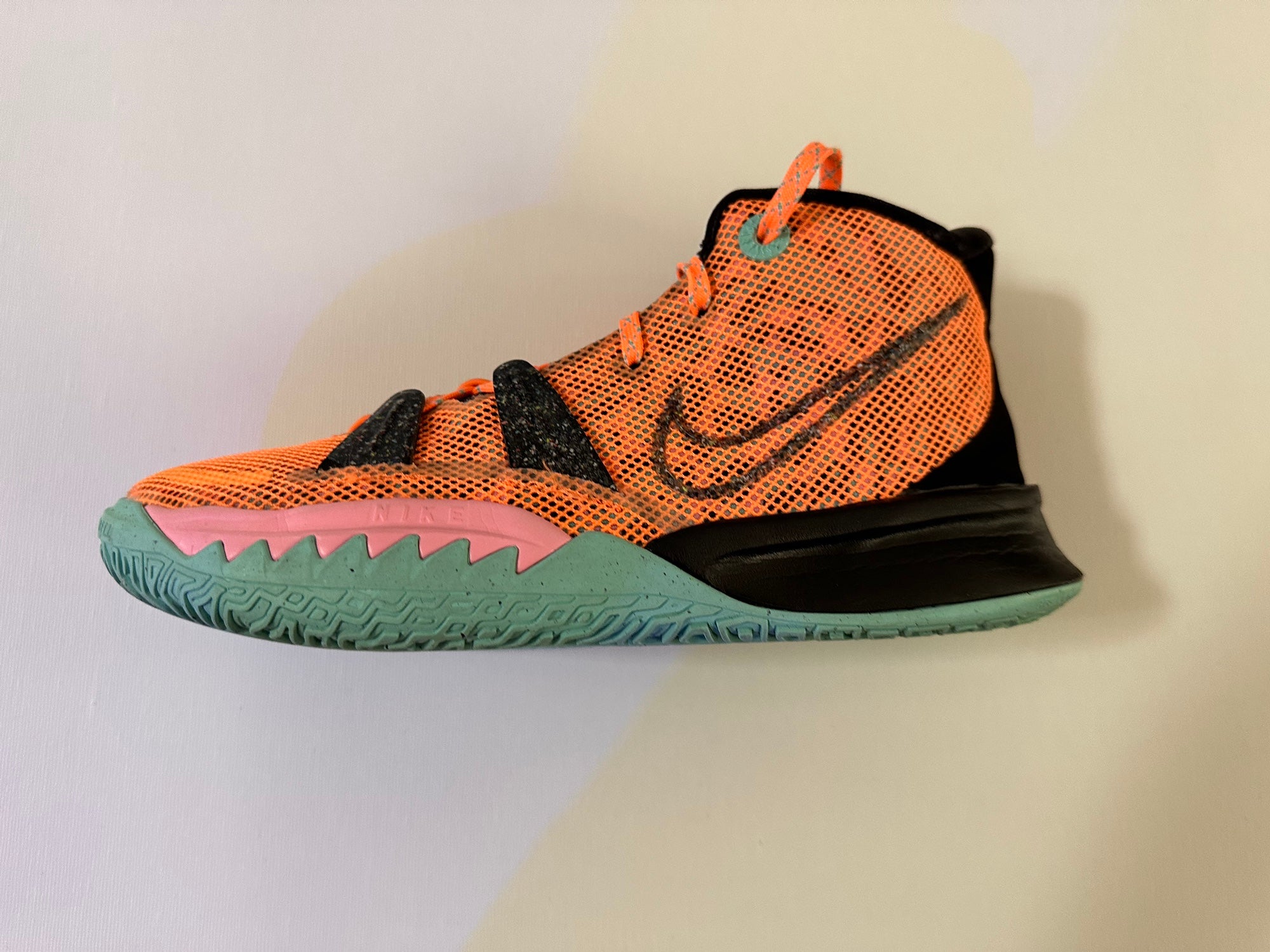kyrie green black orange