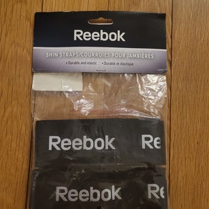 New Reebok Shinguard Straps.  One size Fits All.