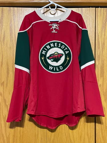 Used authentic size 50 Minnesota Wild jersey good condition