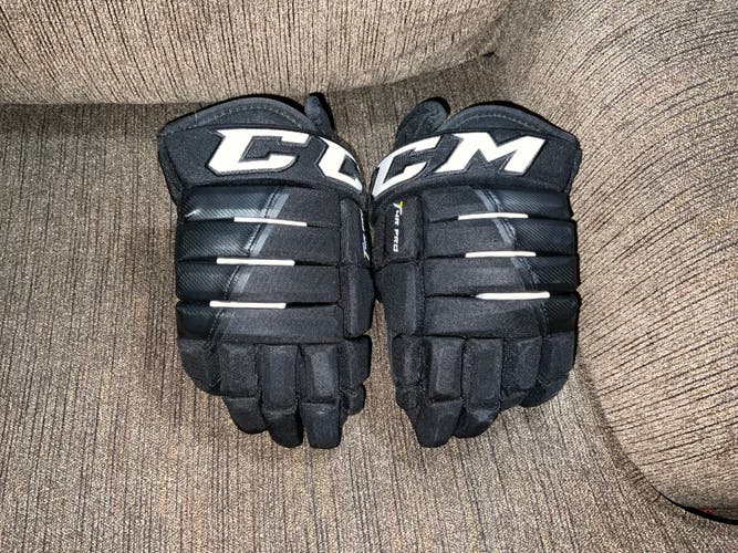 Used CCM Tacks 4 Roll Pro Gloves 12"