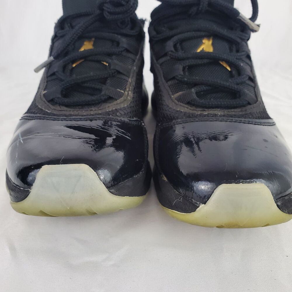 air jordan 11 black gold
