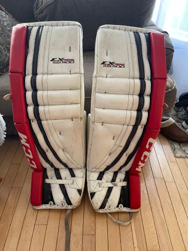 CCM Senior 35+1 Extreme Flex 500 White, Red, and Black Goalie Leg Pads
