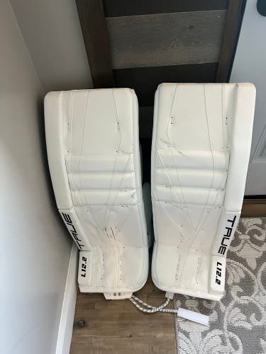 True L12.2 Goalie Pads. All White/ black logos.
