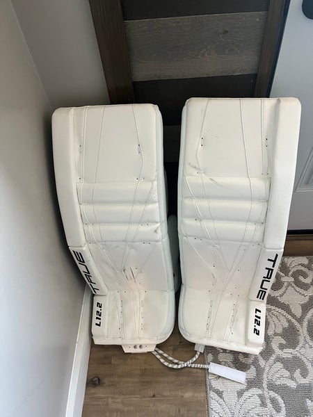 True L12.2 Goalie Pads. All White/ black logos.