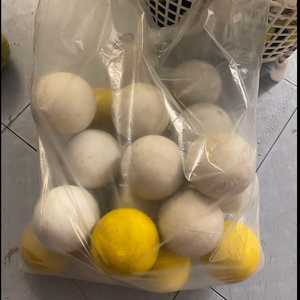 18 Used White and Yellow Lacrosse Balls - Good Condition