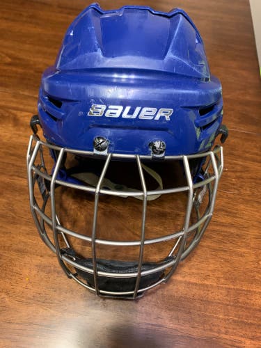 Used Medium Bauer Re-Akt Helmet Royal Blue with Medium Cage
