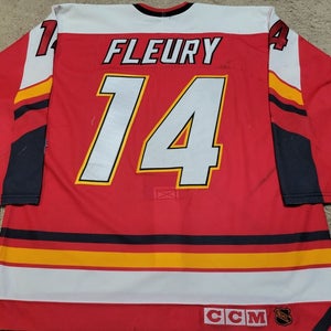 THEO FLEURY 95'96 Red Calgary Flames PHOTOMATCHED Set 1 Game Worn Used Jersey