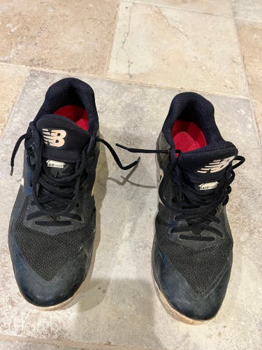 Used New Balance Metal cleats, size 10