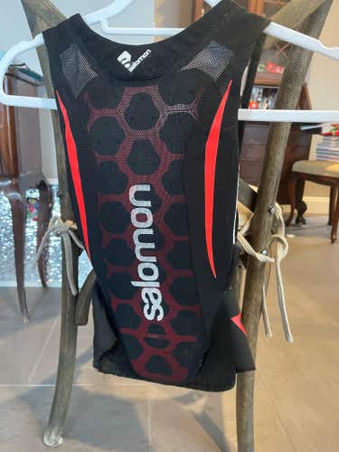Used Junior size 10/12 Salomon Back Plate Protector