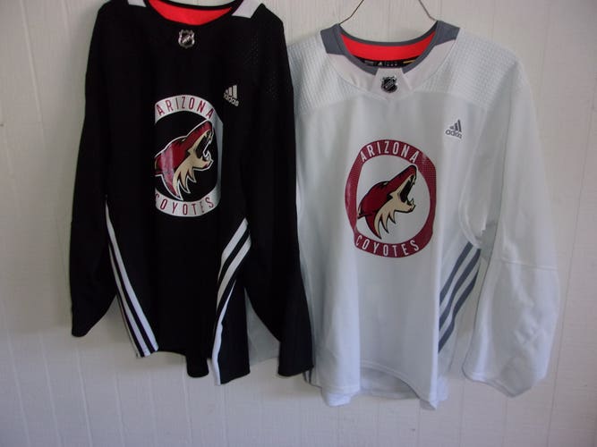 Bundle - 2 Arizona Coyotes worn Adidas practice jerseys (both size 58. 1 white and 1 black)