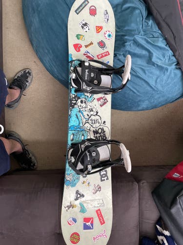 Burton 135 snowboard with burton bindings and 6.5 girls woman’s boots