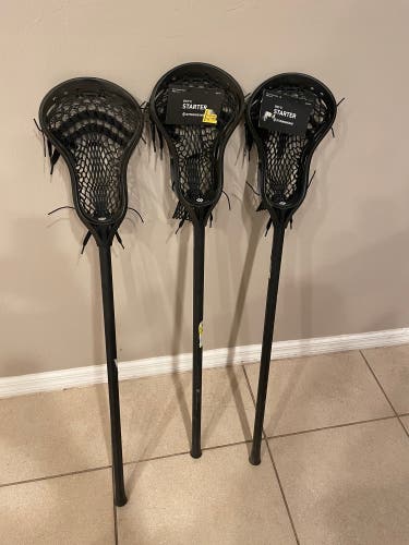 Lot of 3 lacrosse boys stringking sticks
