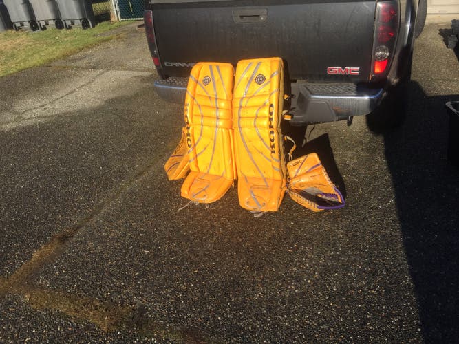Used Sport Gold and Purple Reebok Regular premier Senior Pro Stock Glove and Blocker KOHO 35" Pads
