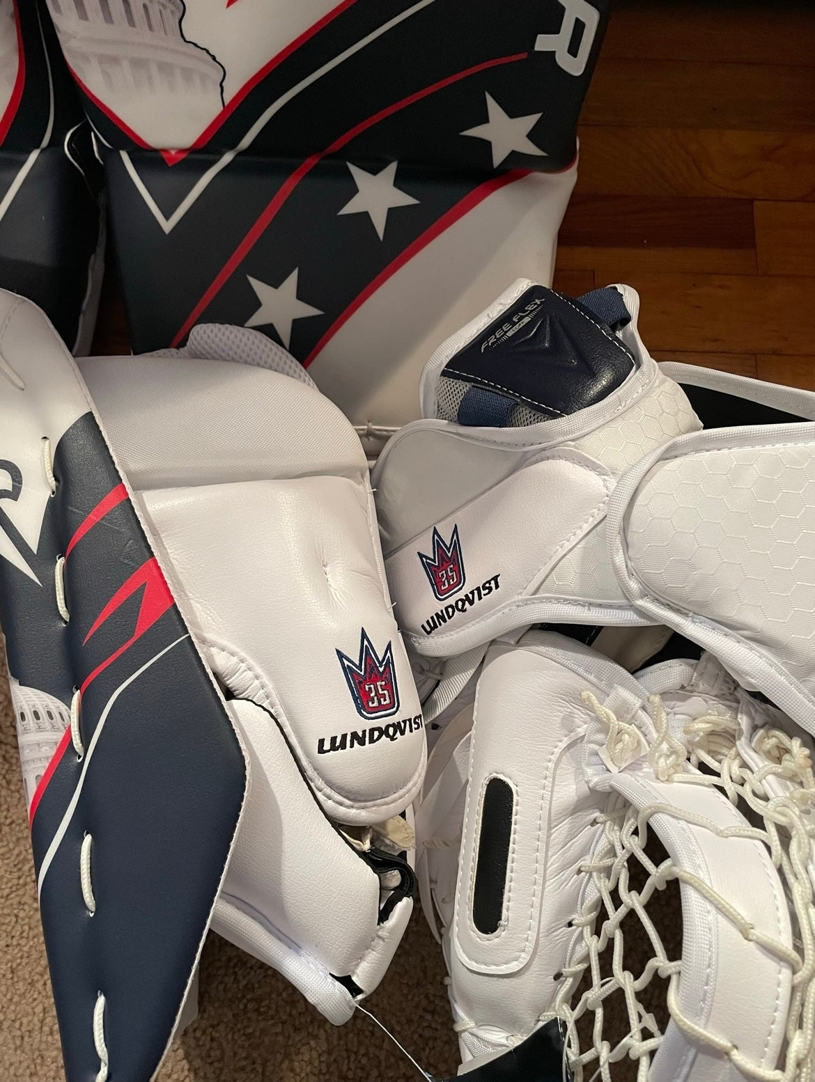 Henrik Lundqvist shows off his new Washington Capitals themed goalie pads.  - HockeyFeed