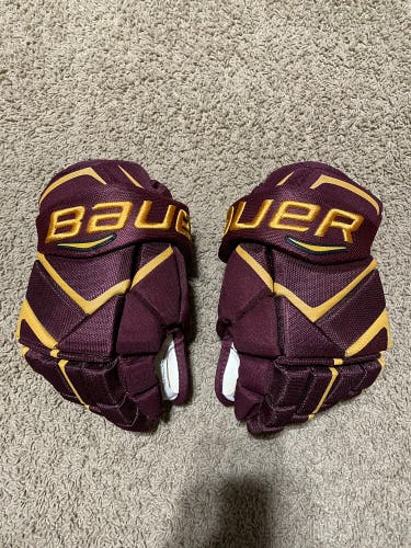 Used University of Minnesota Golden Gophers hockey gloves