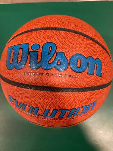 Slightly Used Wilson Evolution Basketball Blue Text