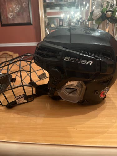 Used Medium Bauer Re-Akt 100 Helmet