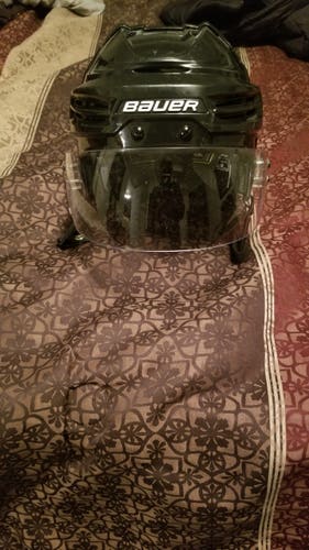 Used Medium Bauer Re-Akt 100 Helmet