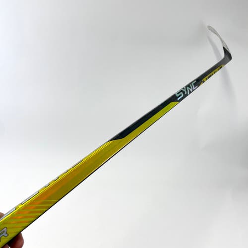 Repaired Right Handed Yellow Bauer Nexus Sync | 87 Flex | P28M Curve | Grip | #J88
