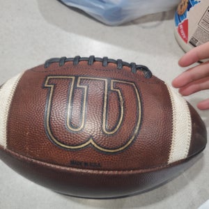Used Youth Wilson Football Gst leather broken in