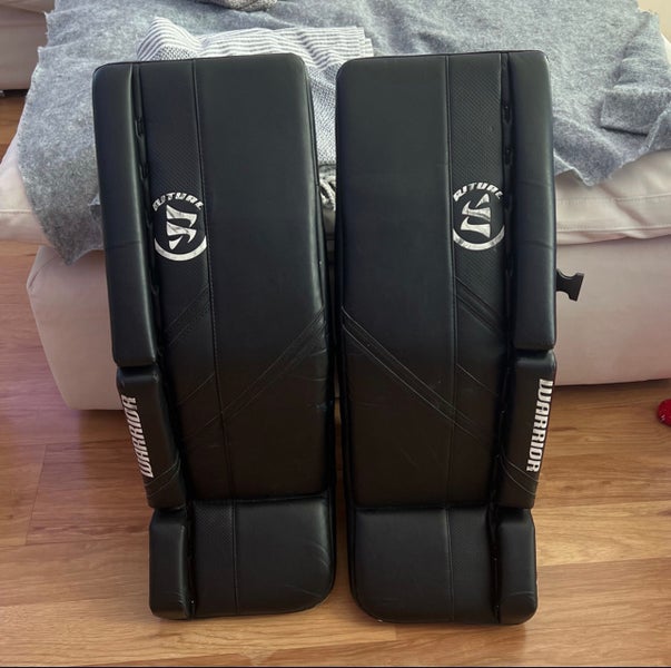 Used 32" Warrior Ritual G5 Goalie Leg Pads