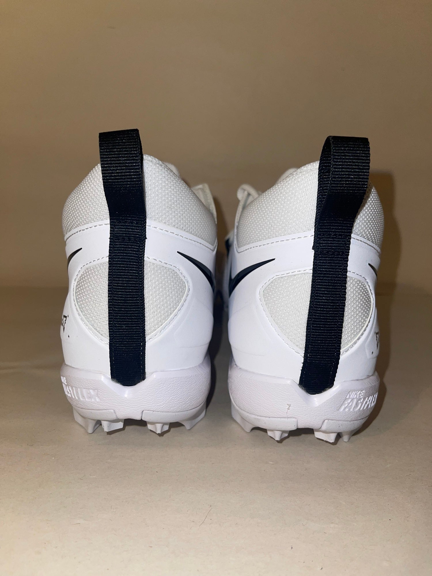 alpha menace shark football cleats