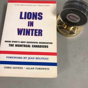 Montreal Canadiens Jean Beliveau autographed book/puck