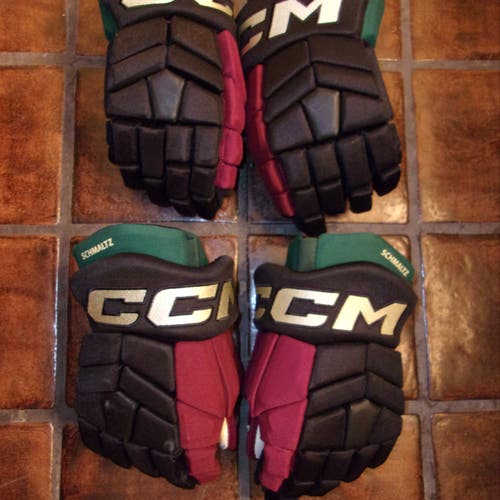 ARIZONA COYOTES (2) Nick Schmaltz game-worn kachina/throwback CCM Pro gloves in size 14