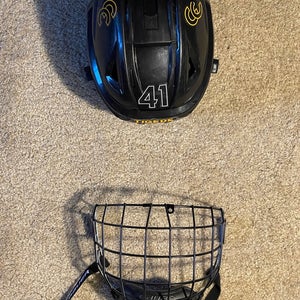 Bauer Pro Stock Re-Akt 150 Helmet w/ cage used medium