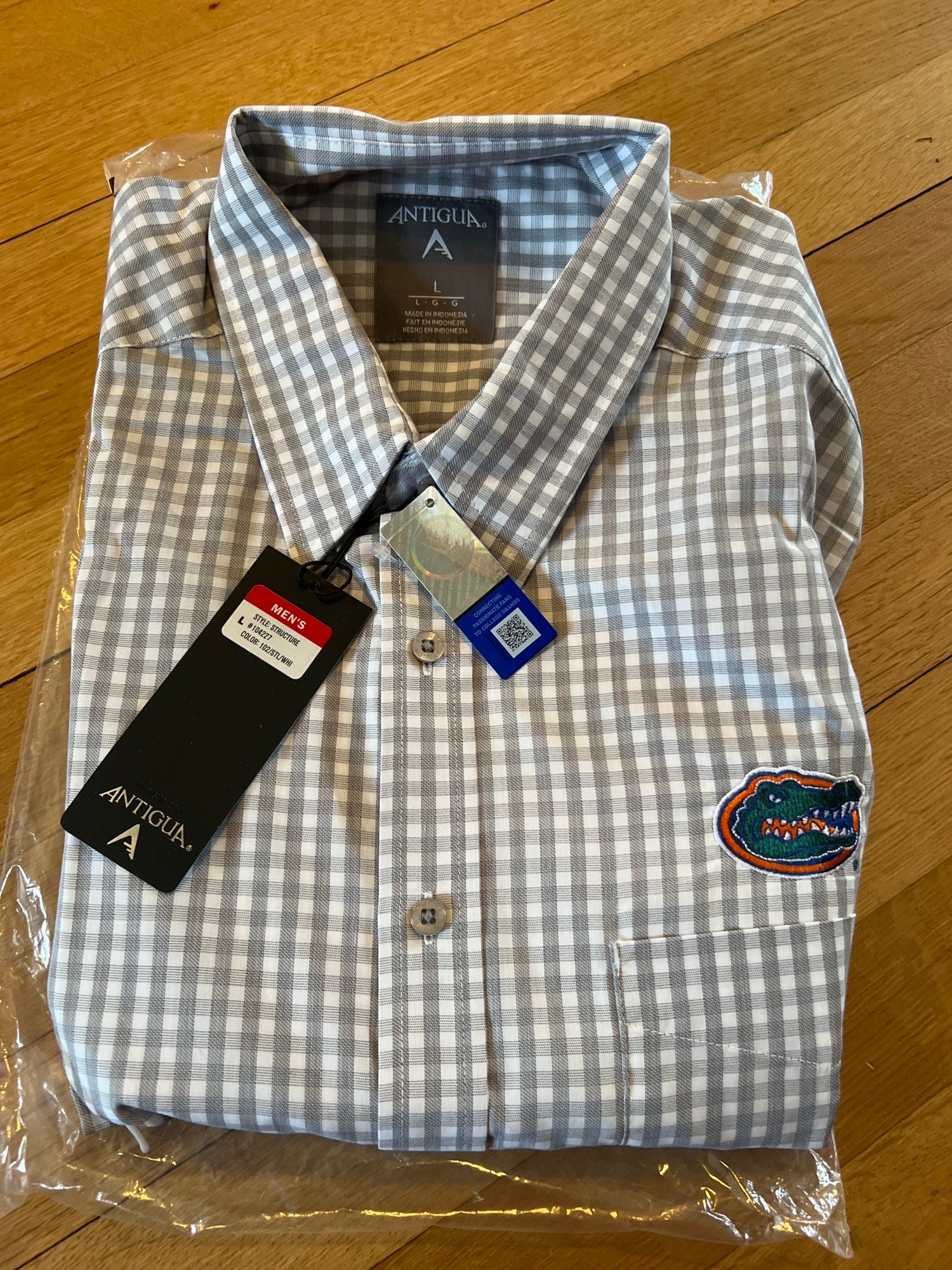 Antigua Apparel / Men's Tennessee Titans Structure Button Down Blue Dress  Shirt