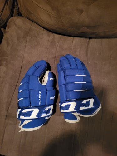 Used CCM Custom 4-roll Gloves 13"