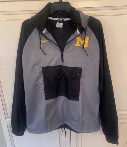Nike- University of Michigan 1/4 zip  black/grey detachable hooded windbreaker.