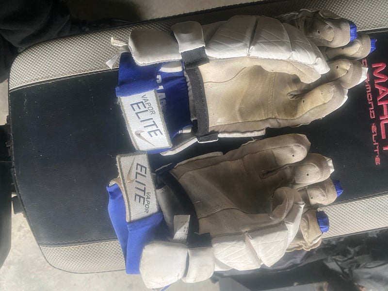 Used Player's Nike 13" Vapor Elite Lacrosse Gloves and small vapor elbow pads