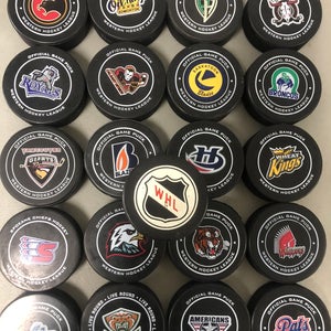 WHL team set of pucks (23)