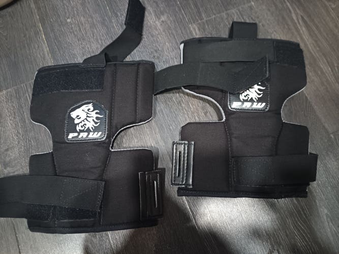 Used PAW knee guards. Senior