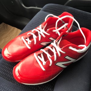 Men’s size 9.5 New Balance metal baseball cleats