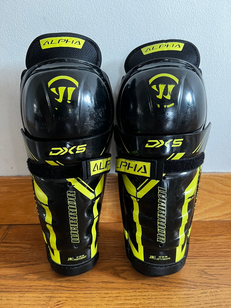 Gently used Warrior DX5 junior 10” shin guards