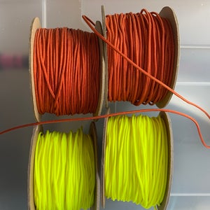 Crosslace spools Burnt Orange and Neon yellow