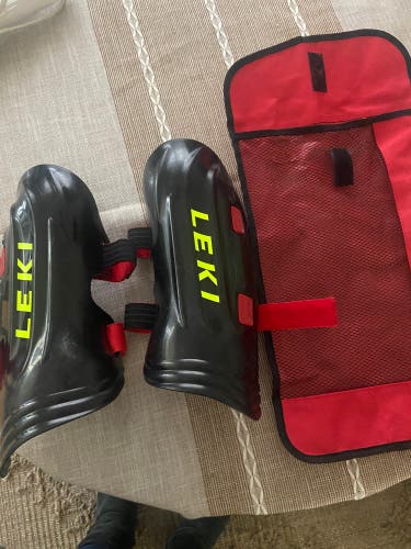 Leki Jr. Shin guards and carry case.  Used a few seasons