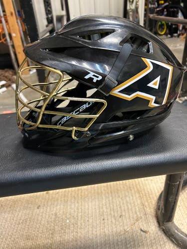 Black Cascade R helmet with gold face mask