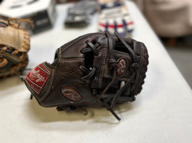 Brown Used Rawlings Gold Glove
